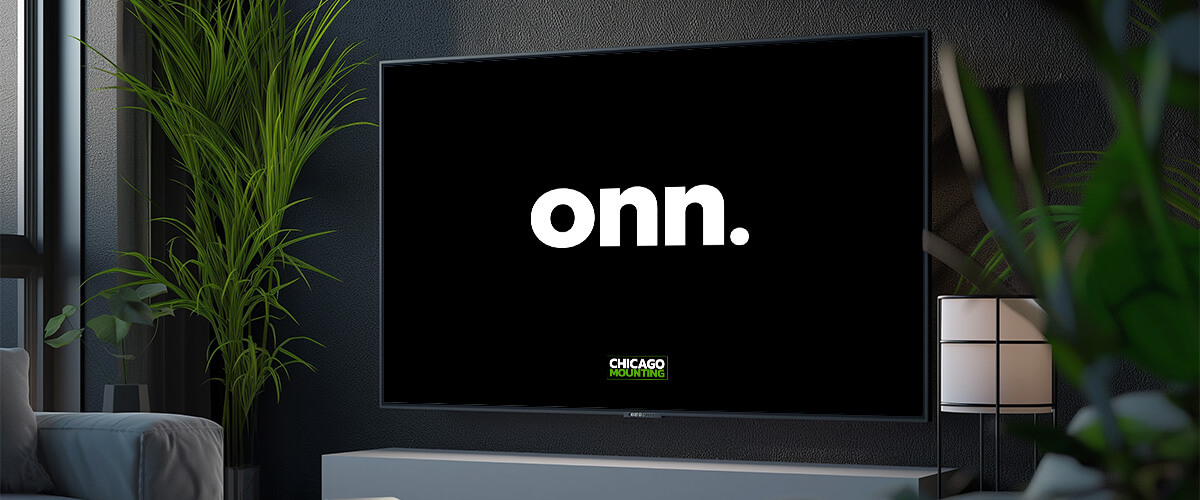 Onn TV mounted on the wall in a clean, modern living space by Chicago Mounting.